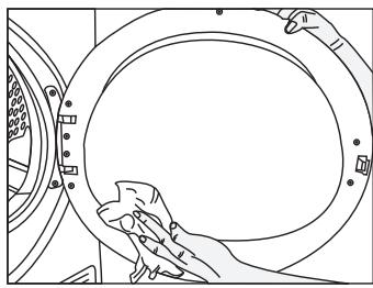 SMEG DHTS82EiN - Nettoyage du filtre à peluche / surface intérieure de la porte de chargement - 9