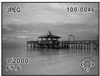 PENTAX KM+KC+18/55+50/200 - Appuyez sur le bouton. - 1