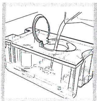 HOTPOINT MCA 16 - Montage du filtre à eau - 3