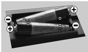 WINDSOR WD32279HD17 - Insertion des piles dans la télécommande - 1