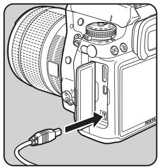 PENTAX K7+DA18-55WR+50-200 - Utiliser l'adaptateur secteur (en option) - 2