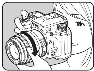 PENTAX K7+DA18-55WR+50-200 - Tournez le curseur du mode de mise au point sur MF. - 2