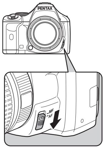 PENTAX K-M - Réglez le curseur du mode de mise au point sur AF. - 1