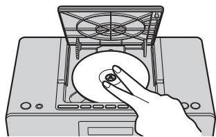 PANASONIC RX-D7OBTEG-K - Insertion d'un CD - 3