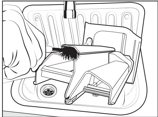 MIELE LAVE-LINGE WCB 100 - Nettoyer le tube et le canal d'aspiration du compartment 念 / - 2