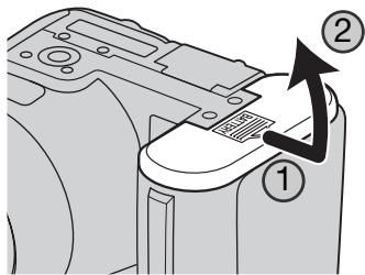 KONICA DIMAGE Z6 - Mise en place des piles/accus - 1
