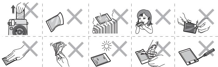 FUJIFILM INSTAX Mini 70 GOLD - Précautions sur la manipulation du film et des impressions - 1