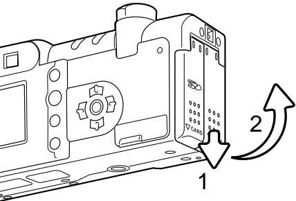 MINOLTA DiMAGE F200 - Mise en place de la pile - 2