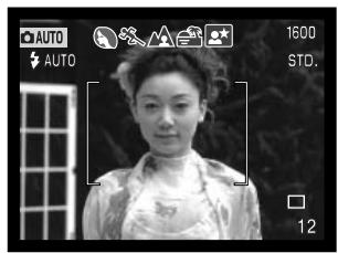 MINOLTA DiMAGE F200 - Sélection automatique d'un programme-résultat numérique - 1