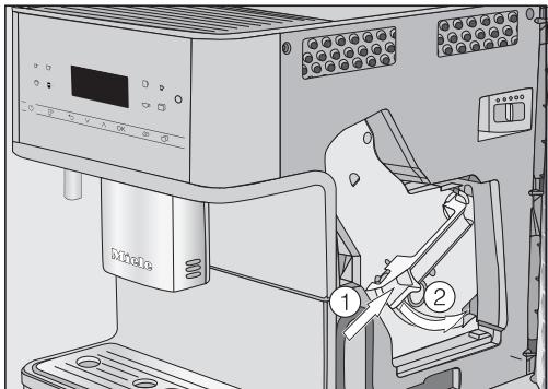 MIELE CM6160 - Introduire des pastilles de nettoyage dans l'unité de percolation - 2