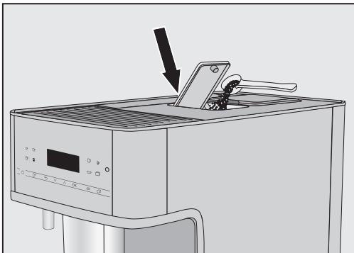MIELE CM6160 - Ajouter le café moulu - 1