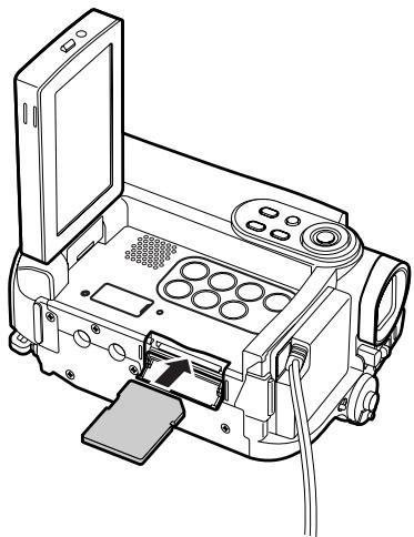 HITACHI DZ-HS301E - Insertion et retrait d'une carte - 1
