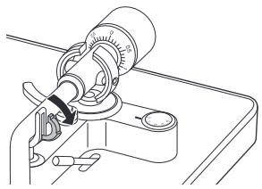 DENON DP-400 - Libérez le verrouillage du repose-bras. - 1