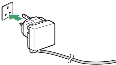 NIKON Z 61I - Branchez l'adaptateur de charge dans une prise de courant. - 1