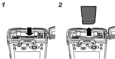 OLYMPUS TOUGH 6020 - Pour retirer la carte mémoire sd/sdhc - 1