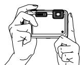 OLYMPUS TOUGH 6020 - Tenez l'appareil photo et cadrez la photo à prendre. - 1