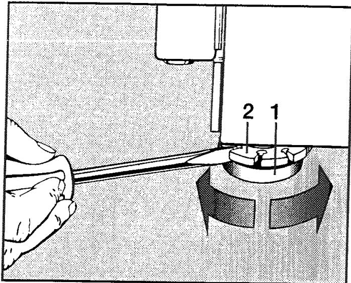 MIELE WT 945 - Dévissage et blocage des pieds - 1