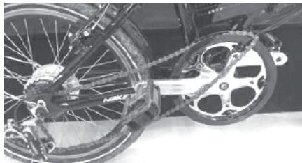 MADVELO NC - - Mettre la chaîne sur le haut du plateau, puis tourné la manivelle vers l'avant - 1