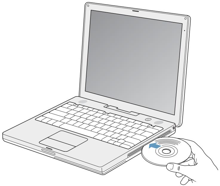 APPLE iBook G4 - Insertion d'un CD ou d'un DVD - 1