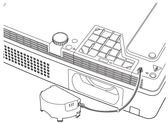 SANYO PLC-XR201 - Fixation du capuchon de lentille - 1