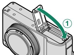 FUJIFILM XF10 - Fermez le couvercle du compartment de la batterie. - 2