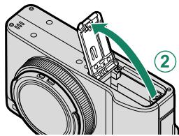 FUJIFILM XF10 - Ouvrez le couvercle du compartment de la batterie. - 3