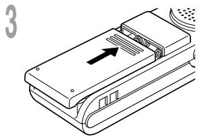 OLYMPUS W-10 - Remplacement des piles - 1