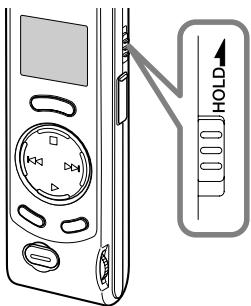 OLYMPUS W-10 - Réglage du commutateur HOLD à la position HOLD. - 1