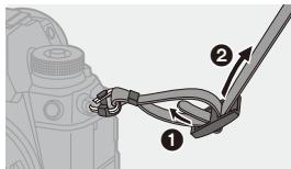 PANASONIC OMe51R - Fixation d'une bandoulière - 4