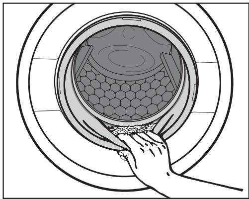 MIELE WTW870 - Sortez le linge. - 1