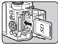 PENTAX Q-S1 GRIS MTL ROUGE CARMIN - Introduisez la carte à fond avec l'étiquette de la carte mémoire orientée du côté de l'écran. - 1