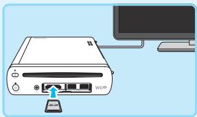 NINTENDO PACK Wii U PREMIUM - Insérez la carte SD dans la console Wii U source. - 1