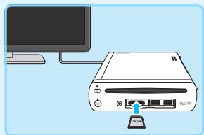 NINTENDO PACK Wii U PREMIUM - Retirez la carte SD de la console Wii et insérez-la dans la console Wii U. - 1