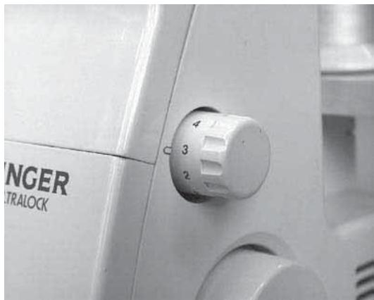 SINGER 14 SH 644 - Réglage de la largeur à l'aide du bouton de réglage - 1
