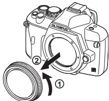 OLYMPUS NC - Enlevez le bouchon avant de l'appareil et le bouchon arrêté de l'objet. - 2