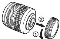 OLYMPUS NC - Enlevez le bouchon avant de l'appareil et le bouchon arrêté de l'objet. - 1