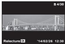 OLYMPUS SP-100E - Pour faire les commandes de lecture sur une photo panoramicque - 1