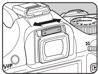 PENTAX KM+18-55+KIT+CHARG - Regardez dans le viseur et faites glisser le levier de réglagedioptrique vers la gauche ou la droite. - 1
