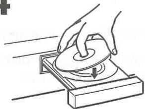TOSHIBA SD39 - Placez un disque sur le plateau. - 1
