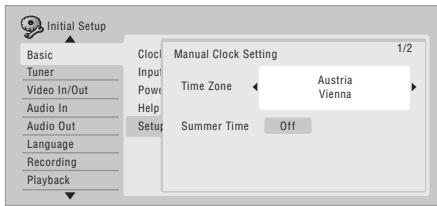 Initial Setup Basic Tuner Video In/Out Audio In Audio Out Language Recording Playback Clock Input Power Help Setup Manual Clock Setting 1/2 Time Zone ← Austria Vienna Summer Time Off
