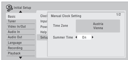 Initial Setup Basic Tuner Video In/Out Audio In Audio Out Language Recording Playback Clock Input Power Help Setup Manual Clock Setting 1/2 Time Zone Austria Vienna Summer Time On