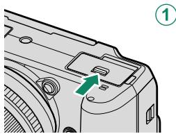 FUJIFILM X-H1 - Ouvrez le couvercle du compartment de la batterie. - 2