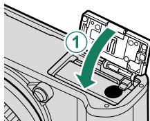 OATAPMX T50 - Fermez le couvercle du compartment de la batterie. - 2