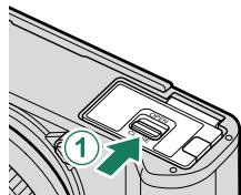 OATAPMX T50 - Ouvrez le couvercle du compartment de la batterie. - 2