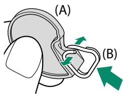 OATAPMX T50 - Ouvrez l'une des attaches de courroie. - 1
