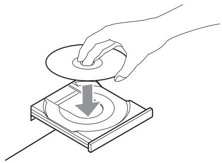 CANON LPP1000 - Placez un disque au centre du tiroir avec sa face sérigraphiée vers le haut. - 1