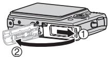 CASIO EX-Z1080 - Ouvrez le couvercle de batterie. - 1