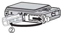 CASIO EX-Z1080 - Ouvrez le couvercle de batterie. - 1