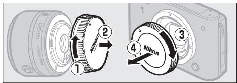 NIKON 1J3WH+10-30+30-110 - Fixez un objectif. - 1