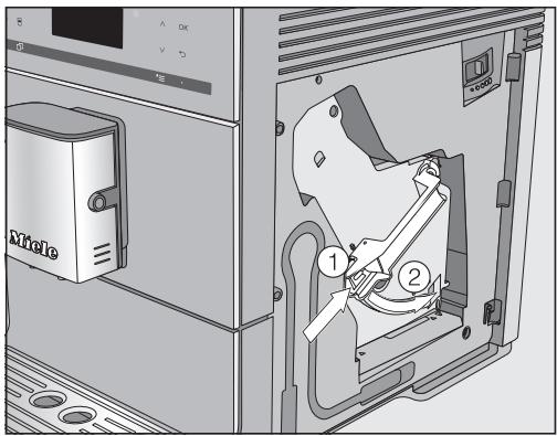 MIELE CM5310NR - Introduire des pastilles de nettoyage dans l'unité de percolation - 2